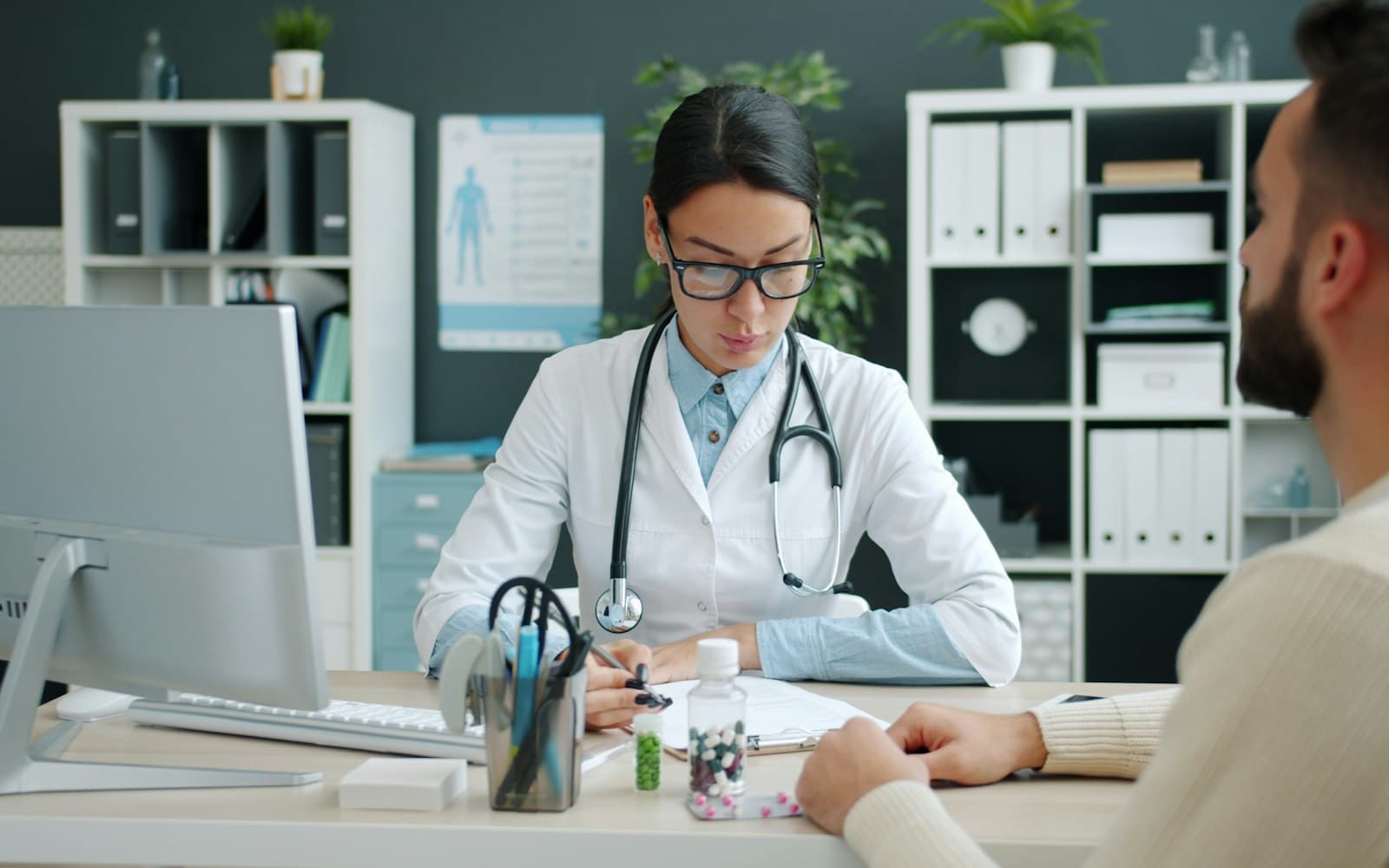 A clinician discussing health information with a male patient